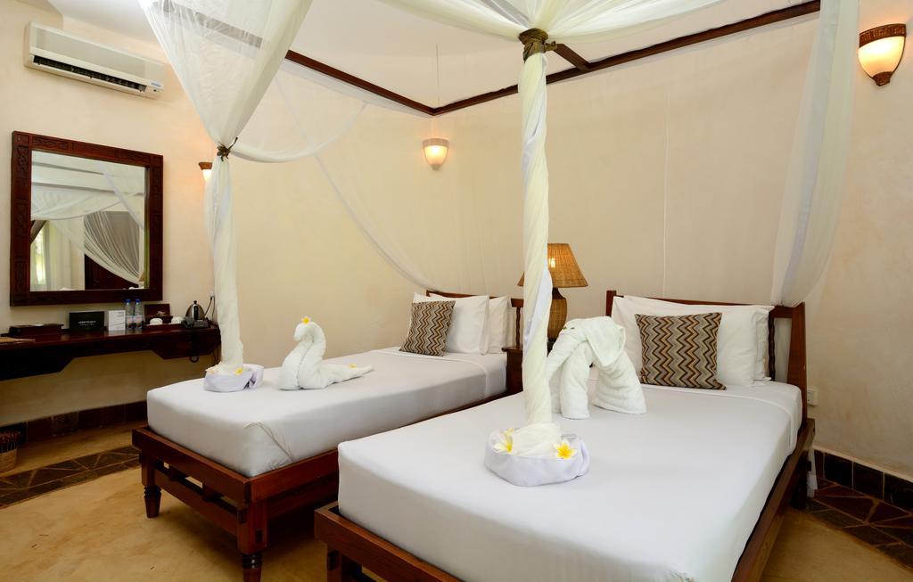 Ocean Paradise Resort & Spa Pwani Mchangani Quarto foto